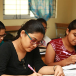 Students entering a government junior college building in Andhra Pradesh for new academic session