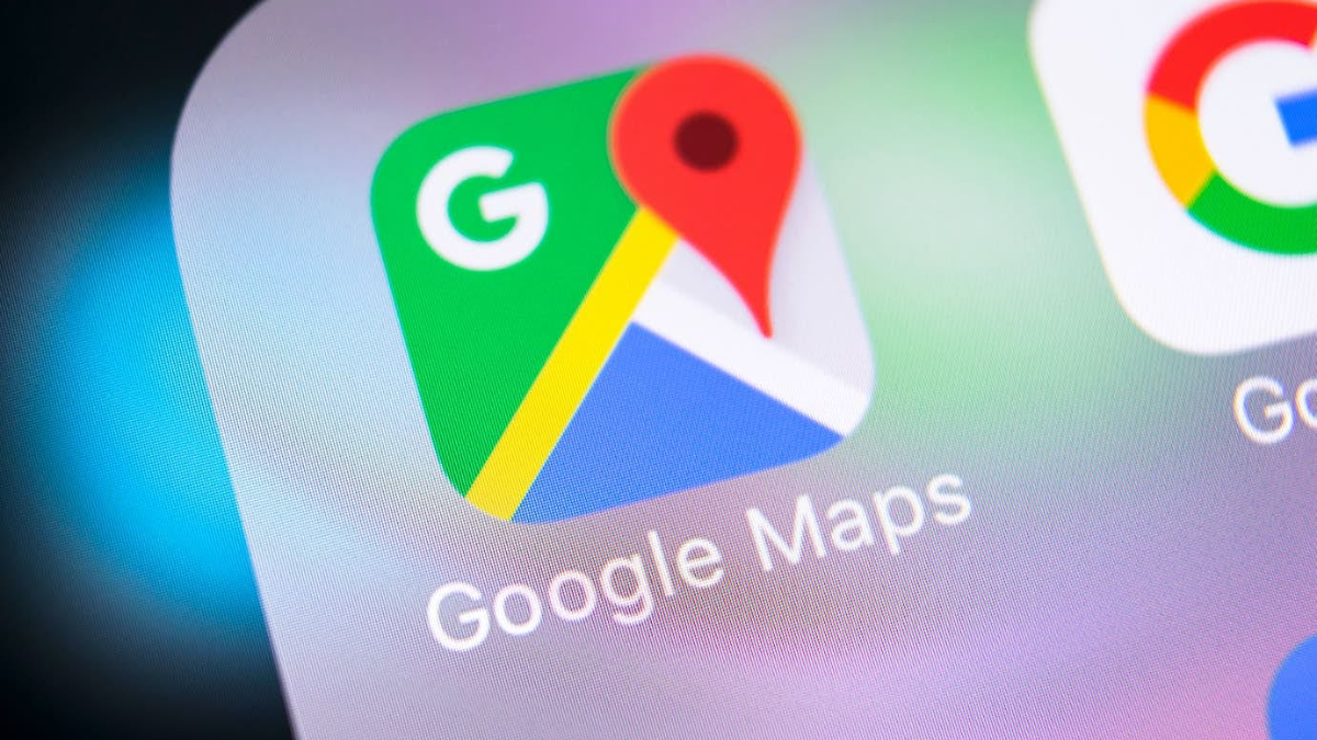 A smartphone screen showing Google Maps with the new Ask Maps AI interface for voice-based local queries