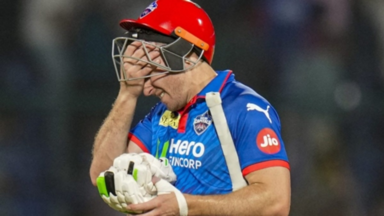 South African cricketer David Miller looking emotional on the field after a close IPL match in Ahmedabad.