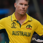 Australian cricketer David Warner captured during a media interaction, now facing legal charges for drink driving in Sydney