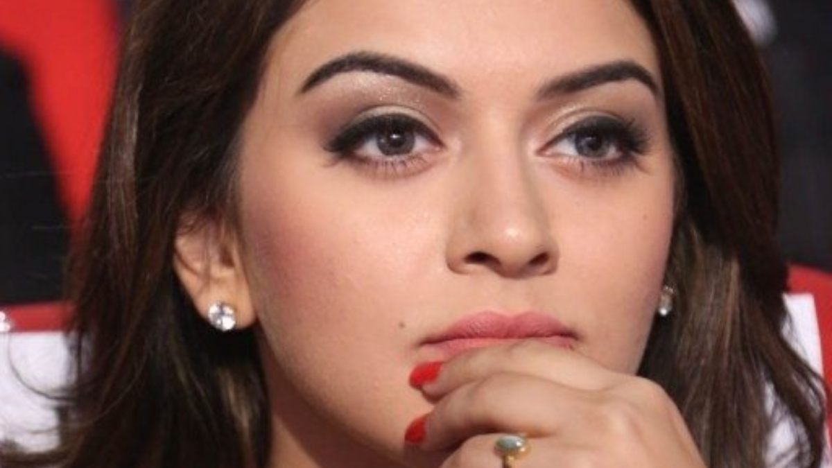 Actress Hansika Motwani appearing for a legal hearing or a portrait representing her current legal situation.