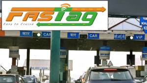 Toll plaza gates on Hyderabad to Vijayawada highway with vehicles passing through FASTag lanes