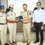 Hyderabad Police She Nethra team members using advanced camera detectors to inspect a trial room for hidden cameras.