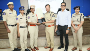 Hyderabad Police She Nethra team members using advanced camera detectors to inspect a trial room for hidden cameras.