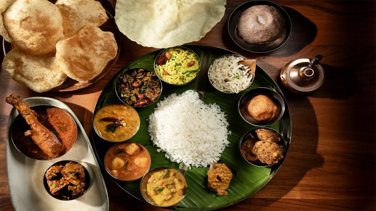 A person eating food slowly and mindfully, focusing on chewing properly for better digestion.