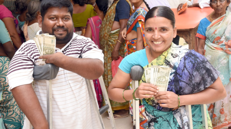 Telangana government distributing free scooties and advanced medical aids to disabled beneficiaries.