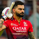 Virat Kohli celebrating his half-century against Mumbai Indians at Wankhede Stadium during IPL 2026.